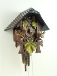 Black Forest house with carved birds