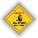 CAUTION LOW FLYING HELICOPTER Hughes 300