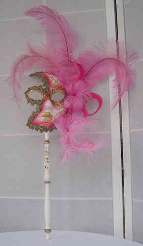 Venetian mask on stick with feathers