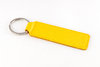 quh-Schlüssel- oder Kofferanhänger Gelb